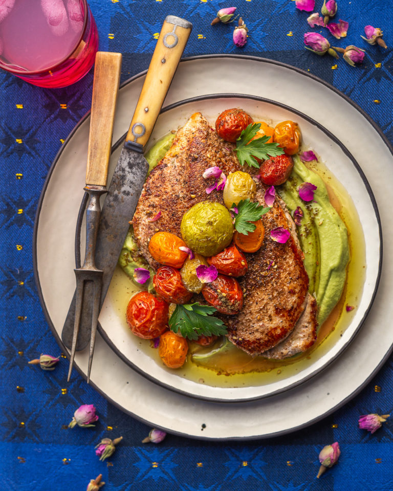 Pan Seared Advieh Chicken Breast With Avocado Tahini Sauce And Zaatar Roasted Tomatoes Primal